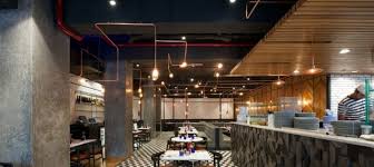 A fresh coat of black paint can help you achieve that industrial style. Open Ceiling Concept In Commercial Interior Design