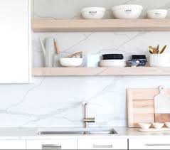 White quartz full height backsplash. Kitchen Countertops Vancouver Lido Quartz Lido Quartz