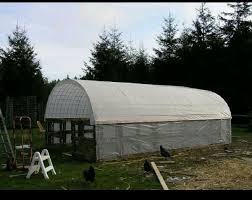 An Outdoor Multi Use Structure Greenhouse Storage Calf Barn Chicken Coop Made With Pallets Stock Idees Jardin Jardin Potager Outils De Jardin