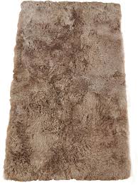 Andiamo teppich schaffell taupe 60cm x 85cm. Oko Island Lammfell Teppich 115 X 190 Cm Fell Teppich Taupe Aus 4 Lammfellen Wohnwelten Shop De