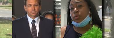 A former Alachua County School Board member says she was illegally removed  from office