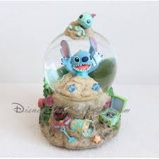 Https Disneyshopcollection Com Fr Lilo Et Stitch 464 Snowglobe Musical Stitch Disneyland Paris Sable Plage Stitch Disney Boule De Neige Boule A Neige Disney