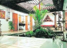 A Central Courtyard At Home Decorated With Rock Garden Traditional House Plans Courtyard House Traditional House