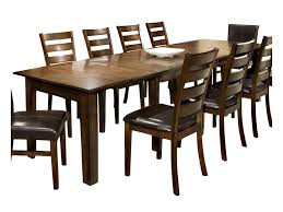 Traditional dining room tables can take up a lot of space, and if you don't have the dining space adequate for that size table, tables with self storing leaves are the perfect choice. Intercon Kona Dining Table With Three 22 Inch Leaves Sheely S Furniture Appliance Dining Tables