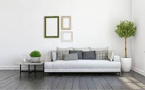 Two sofas facing one another with a fireplace in the center create a quaint communal area. Best Furniture For Dark Wood Floors Auten Wideplank Flooring