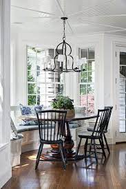 A window seat built into a living room window is perfect for maximizing the light in your room. Shingle Style House Massachusetts Chubbs Hill Renovation Dining Room Windows Home House And Home Magazine