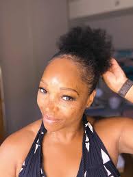 Baby hair and afro puffs. When the hair comes out between protective styles  it's like a carnival over here. Hubs offering to wash my hair, my son  telling me I look beautiful (