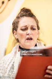 622 Woman Singing Christmas Carol Stock Photos, High-Res Pictures, and  Images