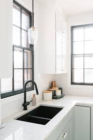 black faucet paired with undermount