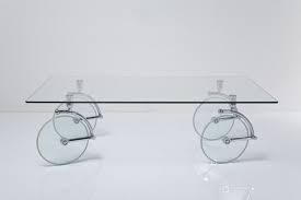 A glass coffee table makes for an elegant, subtle addition to the room, while a coffee table with storage is perfect for creating space for a striking centerpiece. Rectangular Glass Coffee Table With Castors Coffee Table By Kare Design