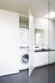It is still one of the most sensible small laundry ideas and designs as it optimise the use of the sink. Integrated Home Appliances And Attractive Cabinets Creating Neat Interior Design Laundry In Bathroom Laundry Room Bathroom Laundry Bathroom Combo