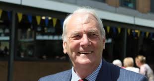 Retired Burton police chief dies as officers stand in silence to pay  respects