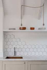 11 Intriguing Kitchen Backsplash Ideas You Ve Never Thought Of Hexagon Tile Kitchen Hexagon Tile Backsplash Kitchen Kitchen Tiles Backsplash