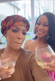 Porsha and her dark liquor is hanging out with Melody Holt