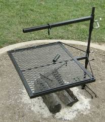 The charcoal pan holder also doubles as a wood grate that maintains the perfect fire. The Mountaineer Grill 129 00 20 X 25 Grate 42 Stake With Support Legs 22 Dutch Oven Arm 2 Collars Grill H Fire Pit Cooking Fire Pit Outdoor Fire Pit
