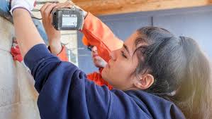 Photos: Day of Service volunteers spruce up Eastern's ballfields