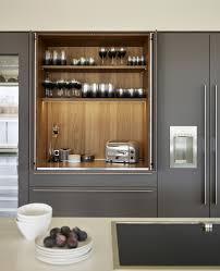 Walnut Veneer Interior Of The Bulthaup Pocket Door With Soft Touch Lava Kitchen Layout Kitchen Design Plans Modern Kitchen
