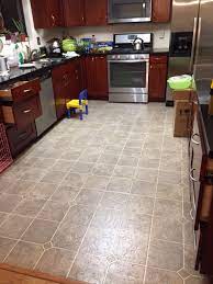 Keep in mind, laminate flooring is not waterproof. Install Tiles On Top Of Laminate Floor In Kitchen Home Improvement Stack Exchange