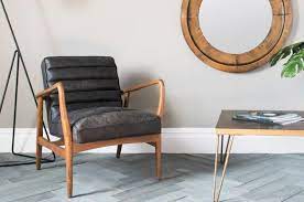 Armchair in brown leather the new chair is characterized by a minimalist form, made on a body made of solid beech and oak wood. Three Great Leather Armchairs Mad About The House