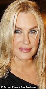 I got my finger stuck in the pulley of a well at my grandmother's house when i was three. Daryl Hannah Glams Up For The Berlin Red Carpet But Is Her Face Looking Suspiciously Tight Daily Mail Online