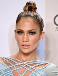 A high bun hairstyle looks elegant and poised but isn't always easy to pull off with bangs. How To Wear A High Bun This Holiday Season Stylecaster