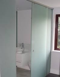 When we shower and don't dry off the by greasing your glass doors/walls with wd40, you create a protective layer on the surface. Sliding Frosted Glass Interior Bathroom Doors With Stainless Steel Track And Frosted Glass Walls Home Doors Design Inspiration Doorsmagz Com