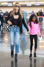 Klum is also a great example of beauty with brains seeing hoe she is. Heidi Klum Dons A Sheer Shirt As She Arrives In Nyc With Daughter Lou Heidi Klum Sheer Shirt Heidi Klum Style
