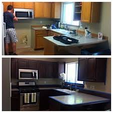 We Used Rust Oleum Stain From Lowe S In Kona Color First We Sanded With 120 Grit Sandpaper Applied The Staining Cabinets Updated Kitchen Kitchen Dining Room