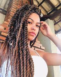 Underneath the braids, twist and cross the hair around a simple low ponytail. 27 Twist Hairstyles Natural With Extensions