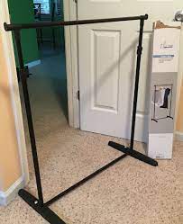 Easy Cheap Diy Backdrop Stand Using A Garment Rack Height Is Adjustable If Not Using For Photography Can Be Diy Backdrop Stand Diy Photo Backdrop Diy Backdrop