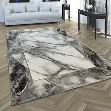 It showcases a central medallion pattern reminiscent of classic turkish designs in brick, gold, and navy hues. Gray And Gold Area Rugs