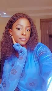 Artist: Nerius Narexnugz Toule. Village: Nonga. District: Rabaul. Province:  East New Britain. Country: Papua New Guinea. Painting Title: Red Parrots  and Emerald Green Parrots Electus. Brilliant in their own world. Size: 48cm