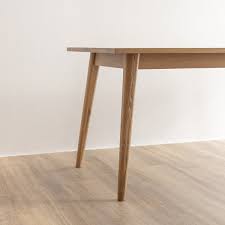 Frankie Beech Dining Table A gorgeous and rustic solid Beech dining table  with a beautifully sleek design, retro legs, and lovely ash oak colouring.  Complete this setting with the Frankie Bench Seat.