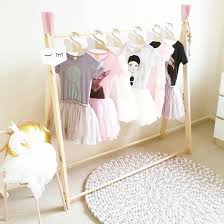 The open design of this clothes rack makes it easy for your child to pick out their clothes to wear for the day. Finlee And Me Kids Room Decor Wooden Clothing Rack 1 Finlee Me
