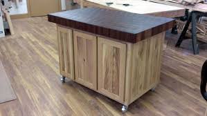 The overall dimensions of the kitchen island are 26w x 26l x 42 h (bar height) and include one shelf. Fivebraids Custom Woodworking Granite And Oak Table