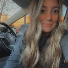 What are the price comparisons for private softball pitching lessons?