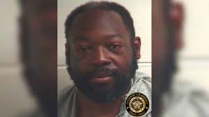 Man charged with murder after Henry County inmate dies