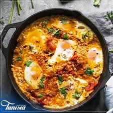 Chakchouka Is Prepared With Soft Boiled Eggs Potatoes Tomatoes Onions Garlic And Spices All In Olive Oil Discovertunisia Shakshuka Recipes Savory Herb