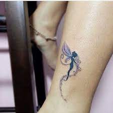 Cool purple ink small fairy tattoo design 148 Attractive Fairy Tattoos Their Meanings Ultimate Guide 2021