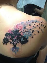 Tree With Birds Flying Away Tattoo Meaning A Beautiful Watercolor Tree Tattoo Inspirational Tattoos Tattoos Trendy Tattoos
