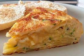 Spanish Tortilla With Zucchini Leeks Potatoes Cheese Spanish Recipes Recipe Spanish Tapas Recipes Tapas Recipes Spanish Tortilla Recipe