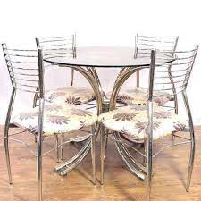 Glass top with a metal base. Ss And Glass Round Table Round Stainless Steel Glass Dining Table For Home Restaurant Rs 4500 Unit Id 21341410597
