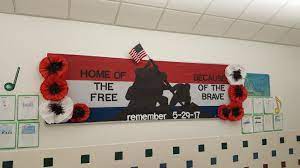 Here's another simple bulletin board that would make a great tribute to the men and women in your community that have served in our armed forces as well as create a fun crafting opportunity for your kiddos and provide some festive decor for your classroom! May Memorial Day Bulletin Board Appreciation Posters School Wide Themes Memorial Day Flag