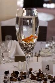 10 Creative Non Floral Centerpieces Non Floral Centerpieces Fish Centerpiece Wedding Centerpieces