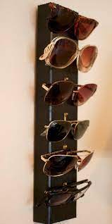 Based on your adjustment of the cord, the glasses can either dangle on your chest, or be held snugly to the face. 12 Diy Sunglasses Holders To Keep Your Sunnies Organized Diy Ideas Diy Sunglasses Sunglasses Storage Diy Diy Sunglasses Holder