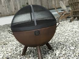 Its unique features include a cooking grate for convenient grilling, a mesh screen for safety 37 Dome Lift Off Fire Pit Screen Carbon Steel Custom Fire Pits Custom Fire Pit For Sale Made To Last Forever