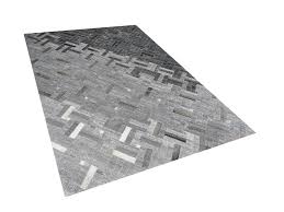 Kann gerne vor ort besichtigt werden. Teppich Leder Grau 140 X 200 Cm Kurzflor Dara Beliani De