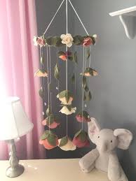 You can even find great nursery room the milestone blanket becomes the perfect photo backdrop for baby's first christmas, easter, valentine's day, halloween, thanksgiving, new. Neutral Felt Crystals Flower Mobile Garden Roses Mobile Girls Room Hanging Decor Baby Girl Mobile Neutral Baby Gift For Girl In 2021 Baby Room Diy