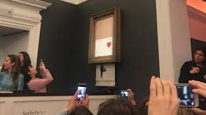 The anonymous street artist posted a video on instagram. Banksy Shocks Art World By Shredding 1 Mn Work At Auction Arab News