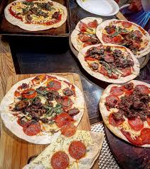 Tackle any great outdoor event with the blackstone family of griddles & cookware. How To Make Thin And Crispy Pizza On The Blackstone Griddle Grizzly Bbq